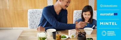 Father and daughter eating soup