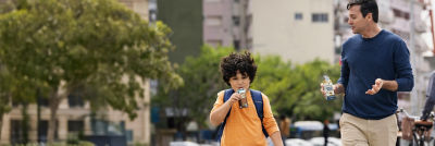 Father and child with drinks on-the-go