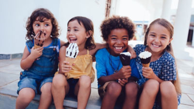 Children eating ice cream cones