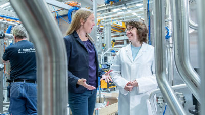 Two women at plant