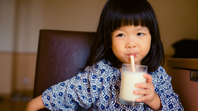 Girl drinking soya beverage