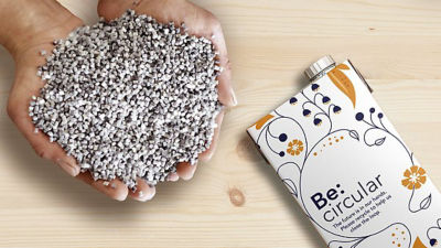 Hand with polymers and a package