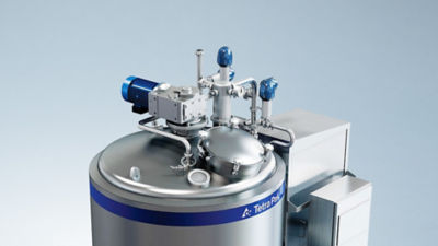 Industrial mixing equipment used for blending powder and liquid ingredients in ice cream production