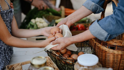 organic eggs in a bag at local market