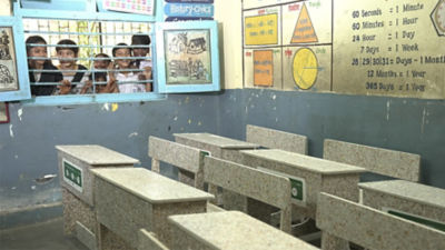 Kids looking into classroom