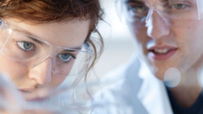 Man and woman working in laboratory