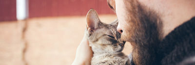 Man holding cat