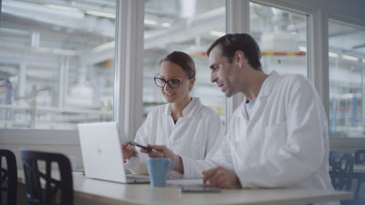 People in lab with computer