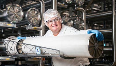 Man using membrane installation tool