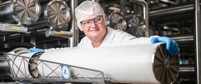 man in factory with membrane filtration