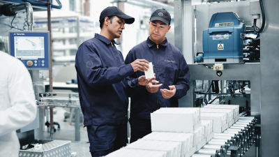 Inspecting package at conveyer