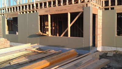 Construction site with boards made from recycled cartons