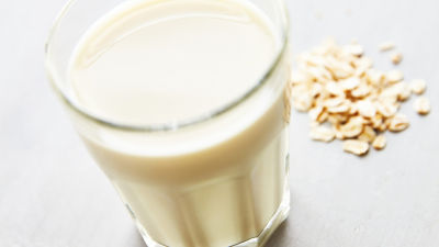 a glass of oat milk