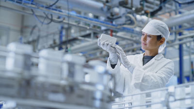 employee looking at tablet