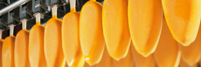 Orange popsicles in production