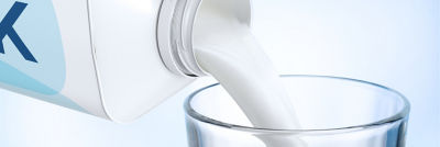 milk poured into a glass 
