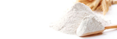 Pile of powder and powder on wooden spoon