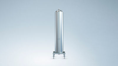 Coiled heat exchanger for heating and cooling applications