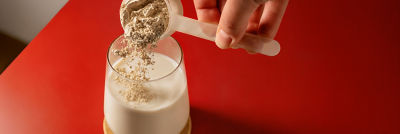 Powder added to liquid protein drink during mixing process