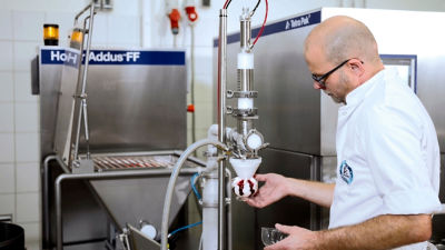 Operator handling ingredients in production environment