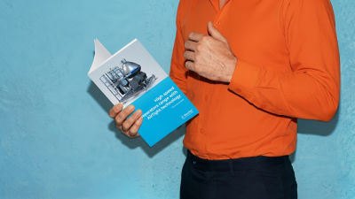 Person holding separator processing brochure