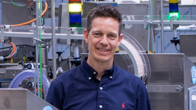 Man in front of machine