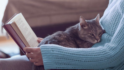 Woman relaxing with a book.