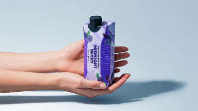 RTD alcoholic beverage in carton in hands