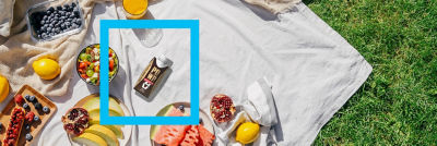 Picnic: fruits, berries, salad and Tetra Prisma Aseptic carton 