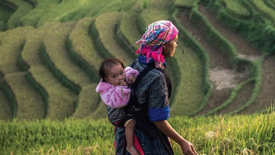 a woman carry her child
