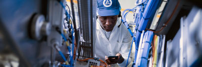 Service engineer testing equipment