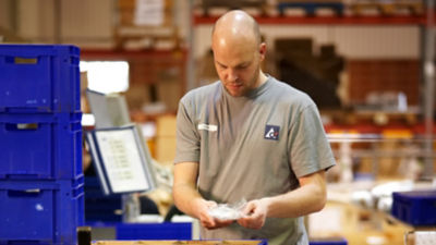 Man in warehouse, Tetra Pak Parts
