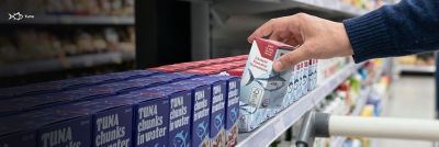 Tuna in Tetra Recart cartons on shelf in grocery store