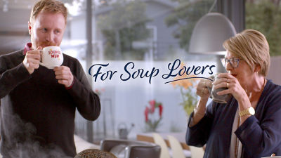 Two people enjoying Rosella soup