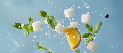 Sugar cubes and orange