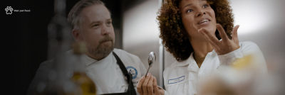 Chef in kitchen using food products in Tetra Recart cartons