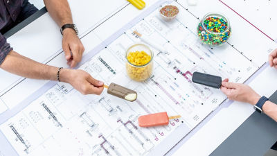 Demo models of ice cream sticks and flow chart