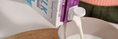 milk being held into a bowl