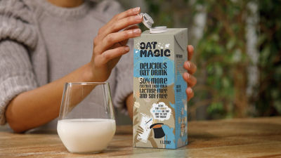 Oat based drink and tethered cap on carton package