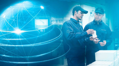 Tetra Pak operators, blue globe in background