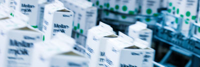 Milk in Tetra Rex carton packages on distribution line