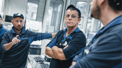 three men in Tetra Pak factory