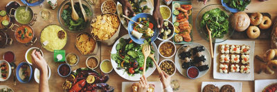 A long table with multiple dishes