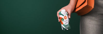 woman drinking green juice