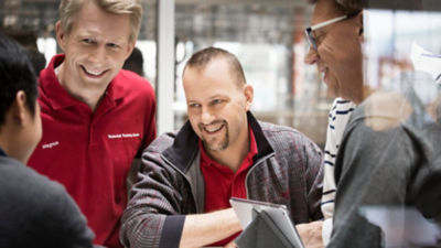 Four training people in a technical center