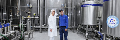 two people looking at a production 