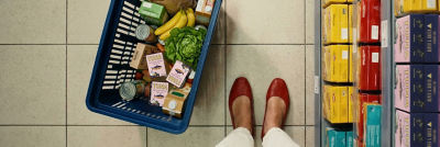 Woman shopping for milk