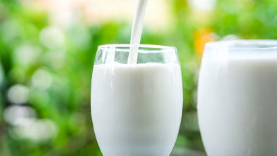Milk poured into glas