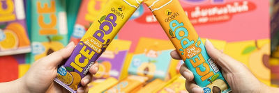 two hands hold icepops