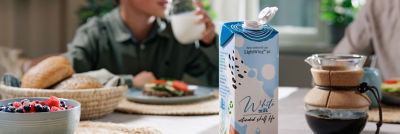 Breakfast, milk in Tetra Brik carton and coffee pot